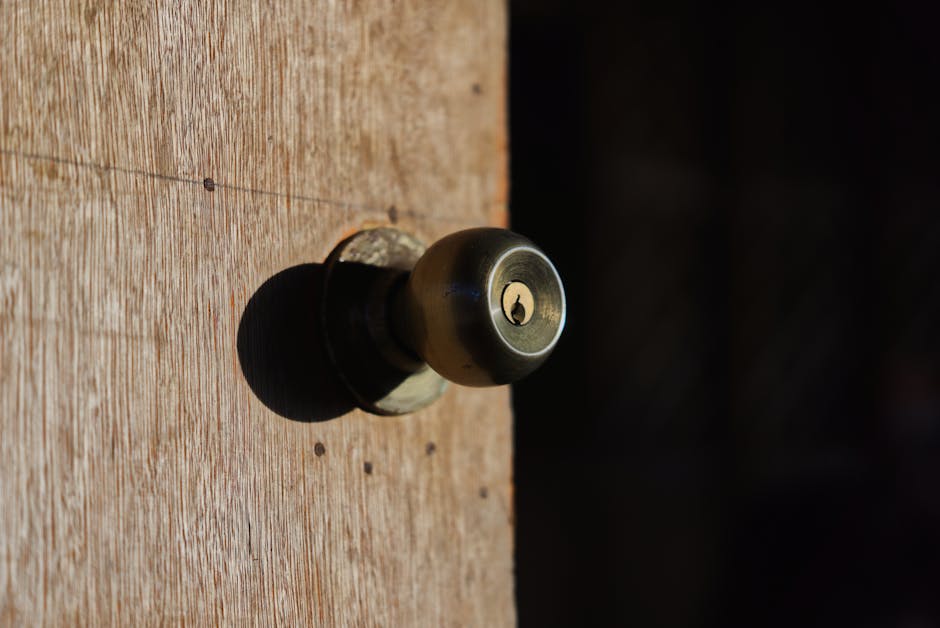 Brass door knob detail on a premium entry door